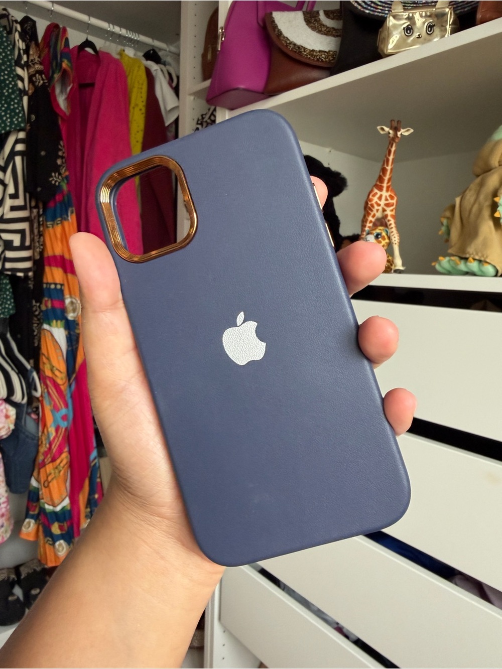 Apple Navy Blue iPhone Case with Gold Camera Trim and Apple Logo